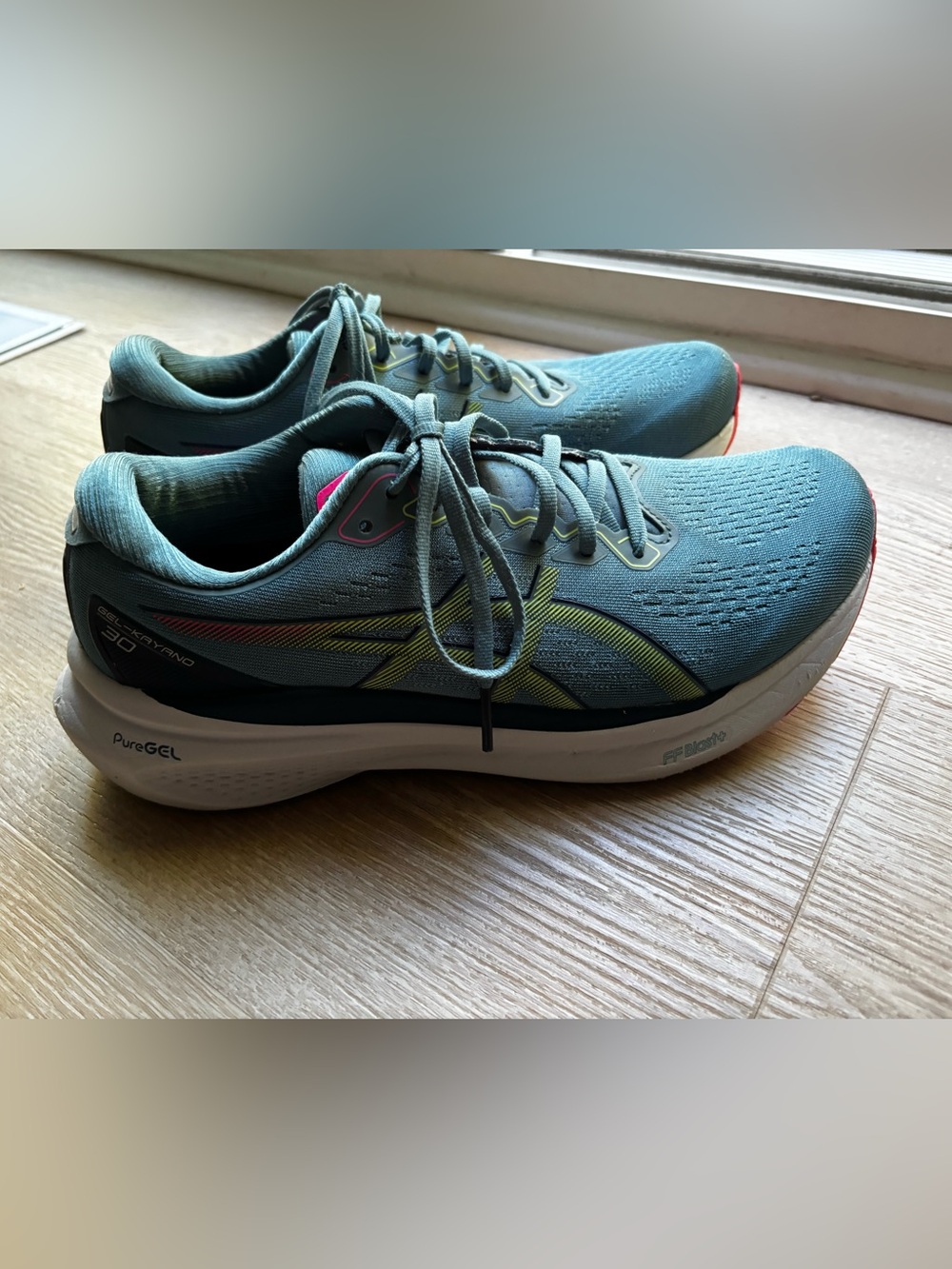 Asics Women's Teal Running Shoes with Neon Yellow and Pink Details